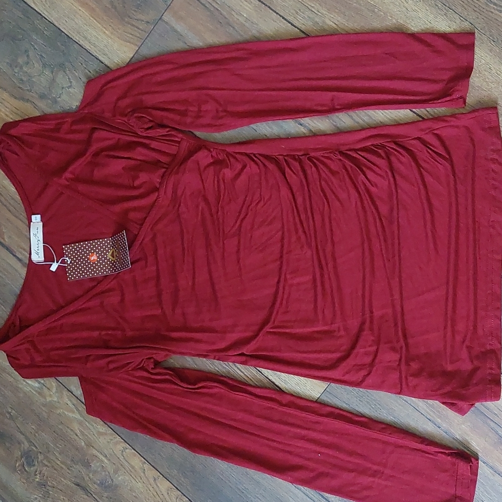 Women's long sleeve peekaboo shoulder v neck blouse. Size S